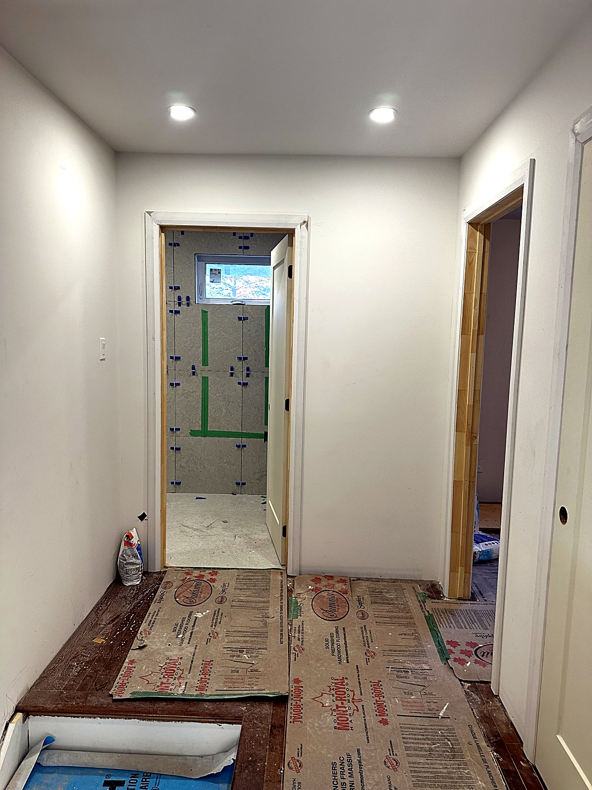 Hallway and bathroom tiling in a second-storey addition