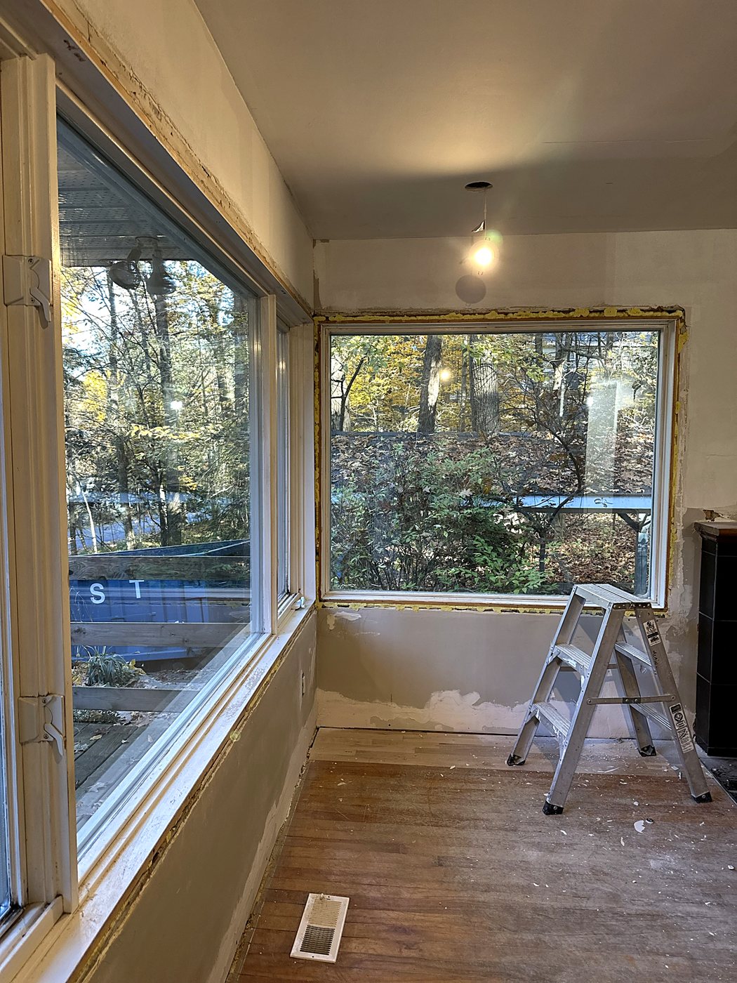 Sunroom with corner windows – full home renovation in Hudson by Buildrex Construction
