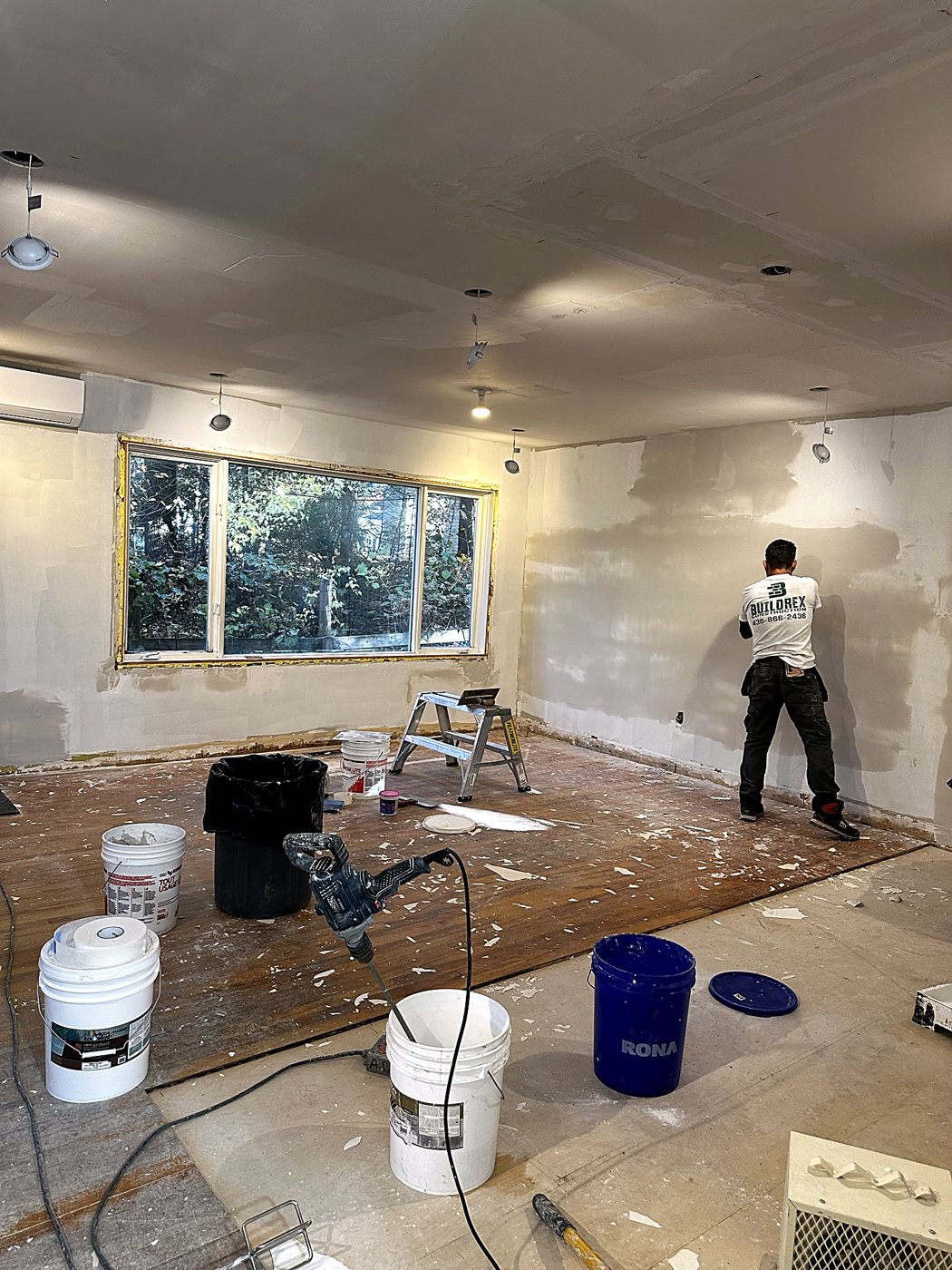 Living room plaster repair – full home renovation in Hudson by Buildrex Construction