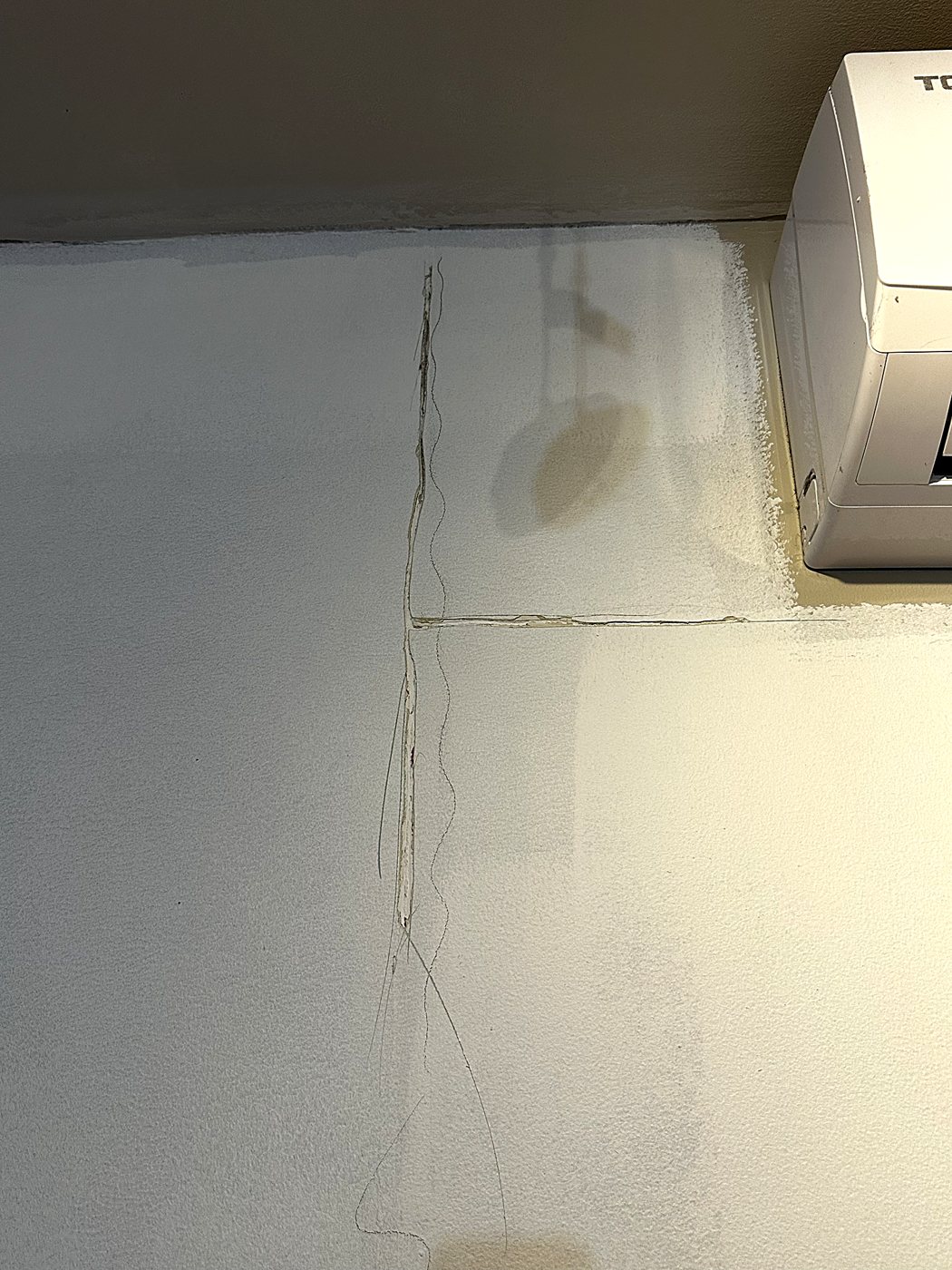 Cracks at the ceiling line – full home renovation in Hudson by Buildrex Construction