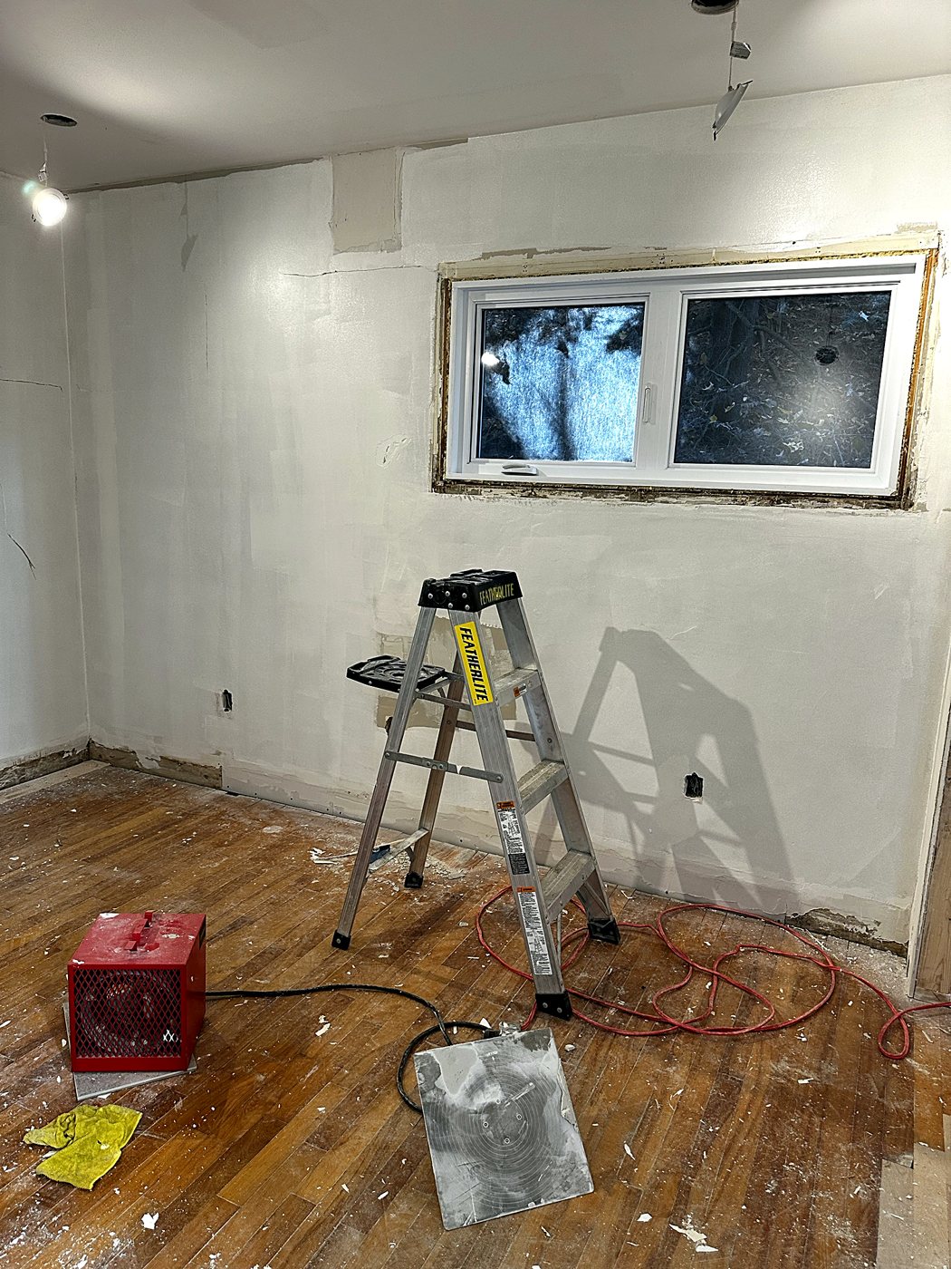 Bedroom with cracked walls – full home renovation in Hudson by Buildrex Construction